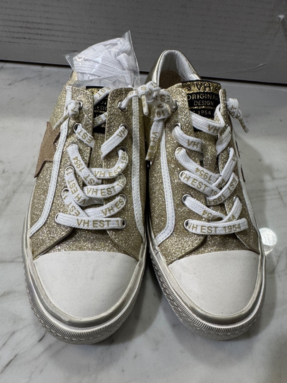 Vintage Havana Cream and White Slip-On Sneaker Label